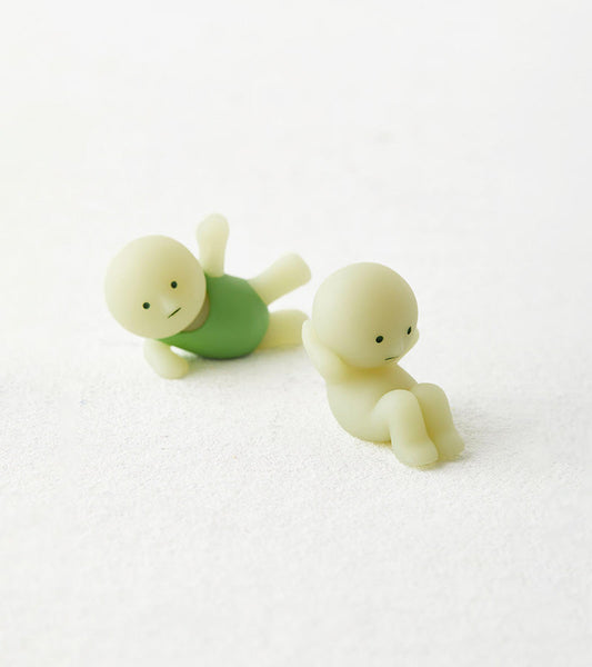 Figurine fluorescente Smiski - série Exercising 